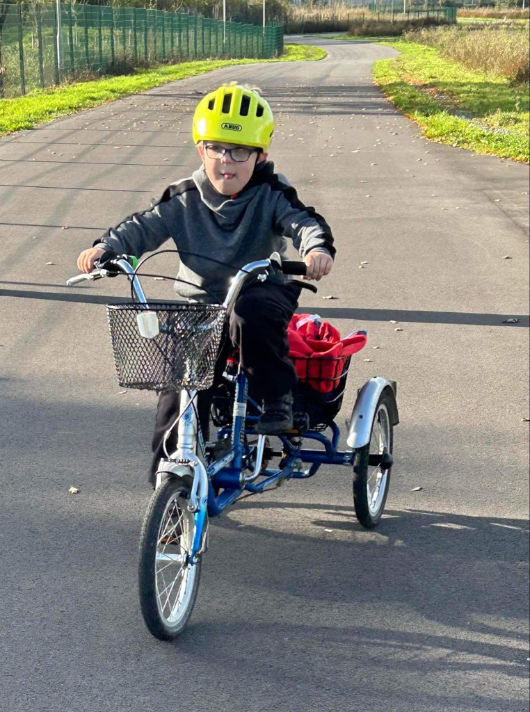 Photo of a SEND child enjoying his bike on the Moredon cycle track.
