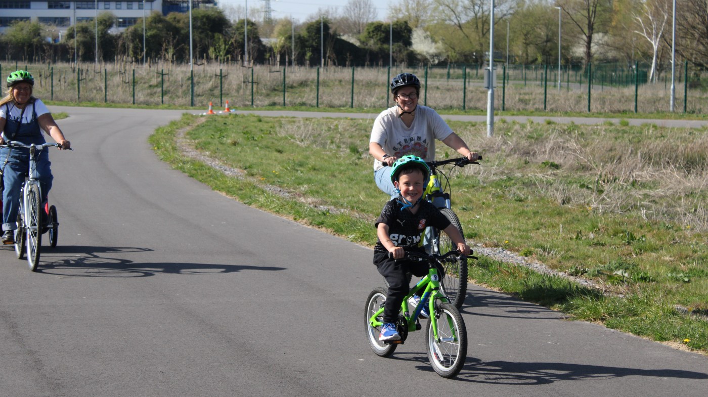Photo of 5-year-old Teddy cycling independently on the Moredon cycling track